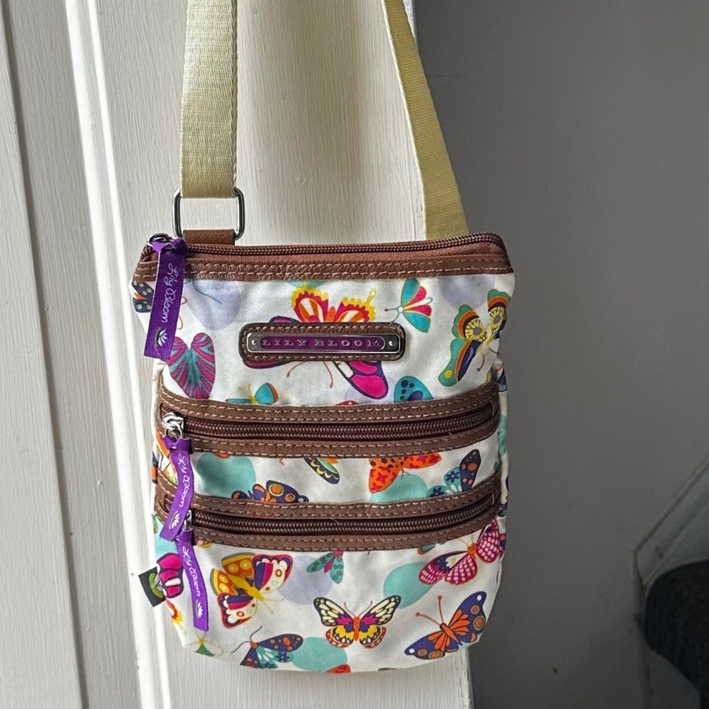 Lily Bloom Crossbody Multicolor butterflies w/lime interior.